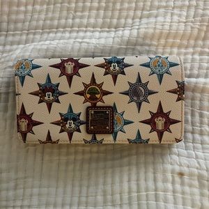 Limited Edition. Dooney and Bourke Disney Crossbody wallet. Parks Passport Print